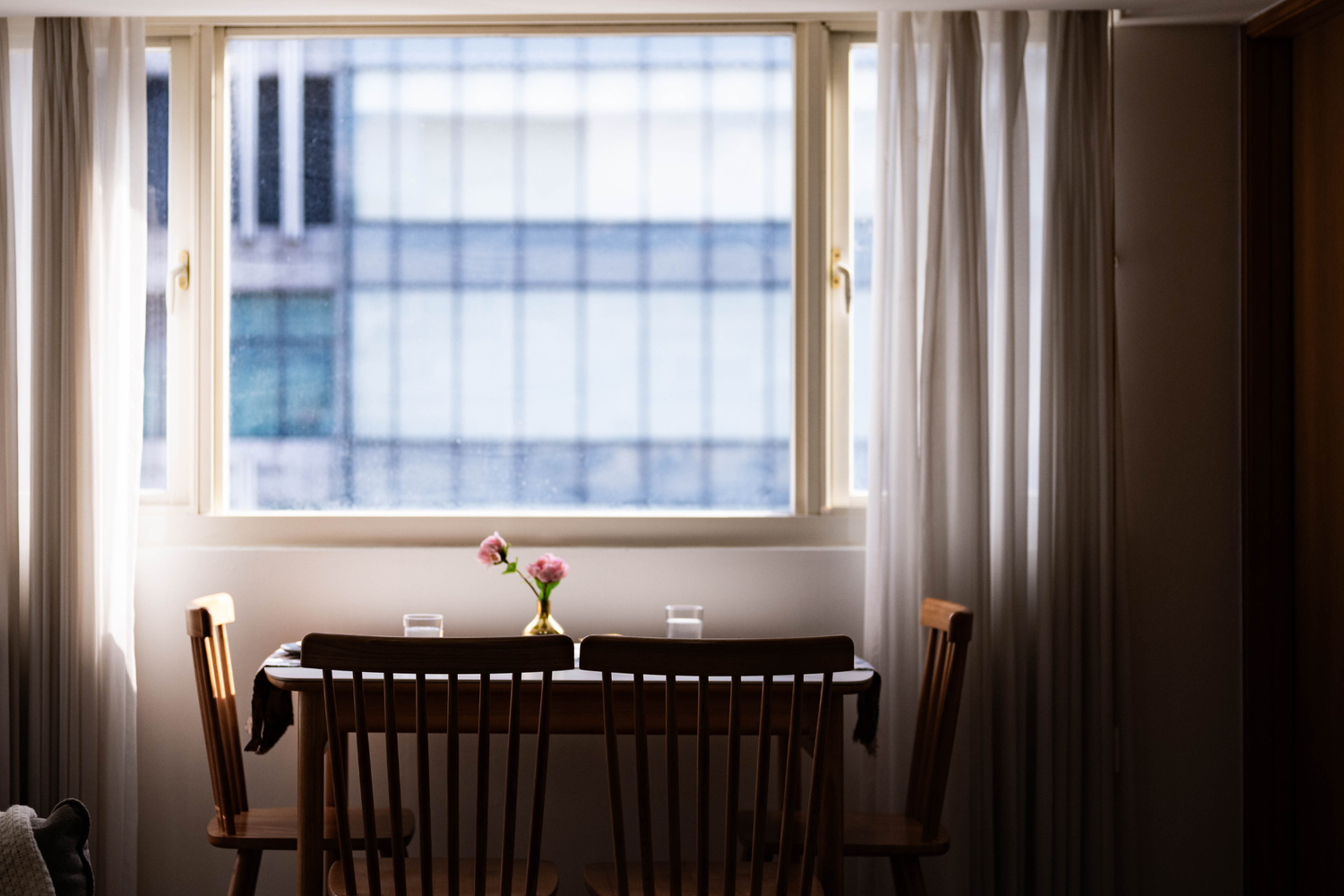 Modern Dining room in Taipei Taiwan short-term apartment with minimalist design - Kolette Home