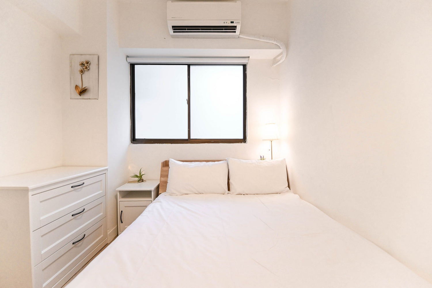 Cozy bedroom in Taipei Taiwan monthly apartment with premium bedding and quiet atmosphere - Kolette Home