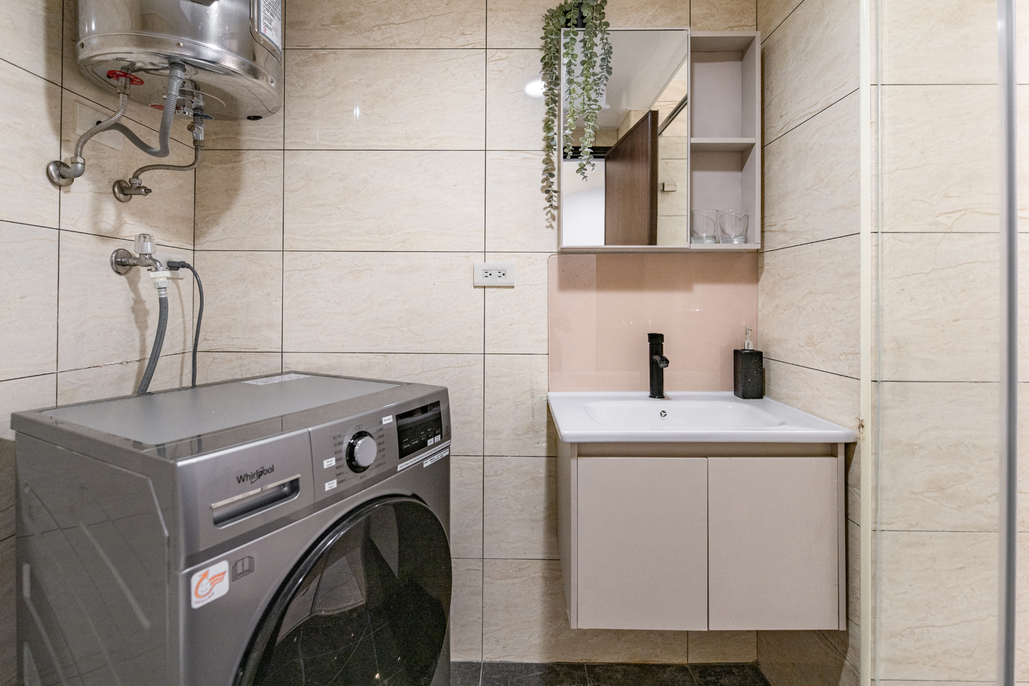 In-unit laundry with washer and dryer in Taipei Taiwan short-term apartment for convenience - Kolette Home
