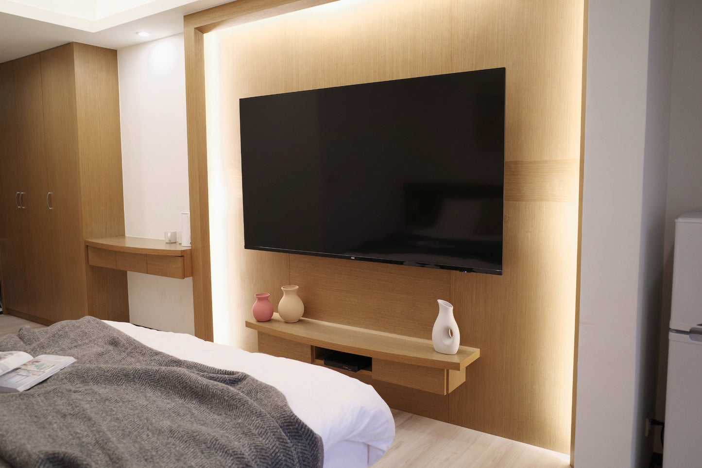 smart tv in Taipei Taiwan short-term apartment with minimalist design - Kolette Home