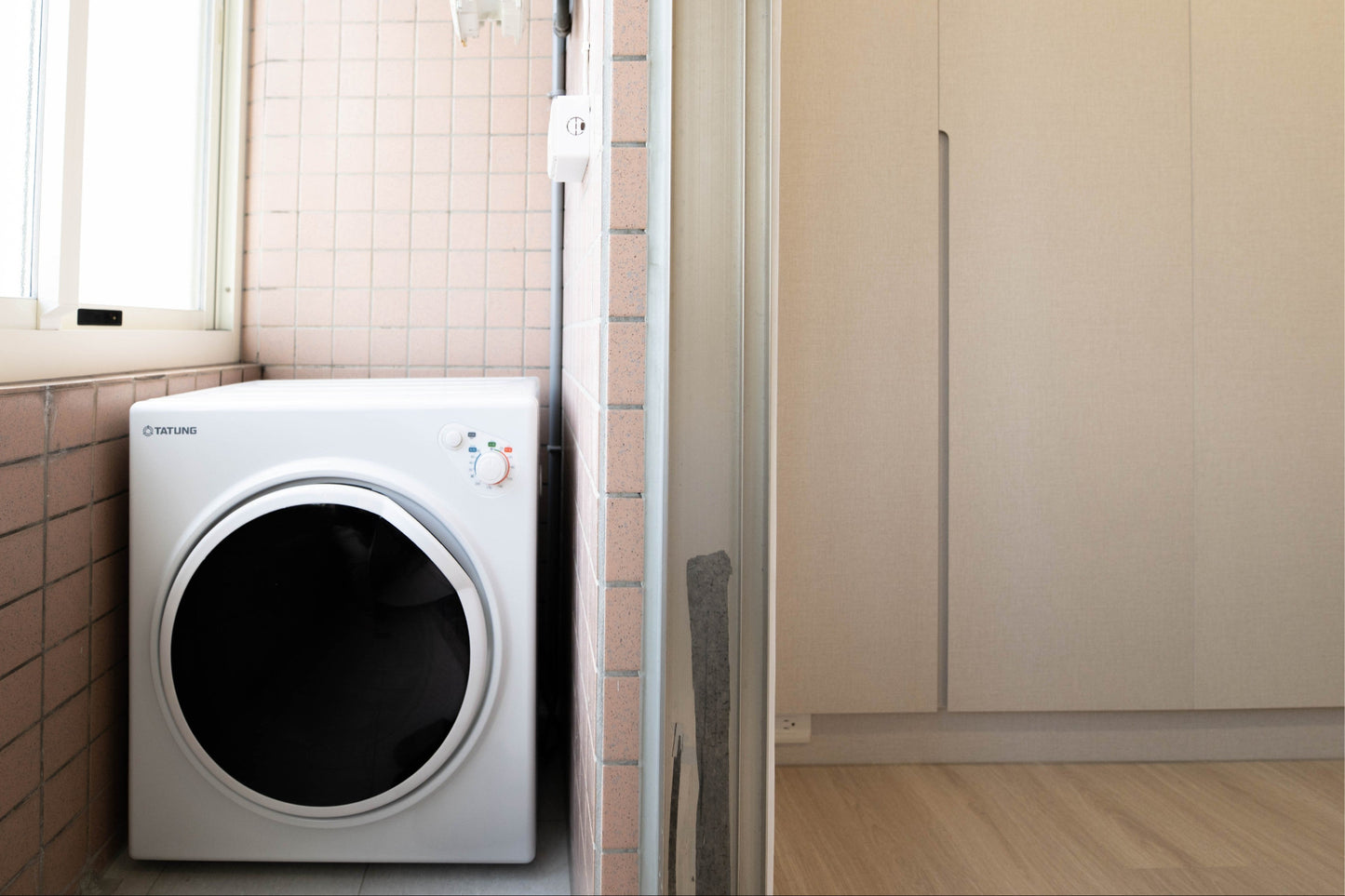 In-unit laundry with washer and dryer in Taipei Taiwan short-term apartment for convenience - Kolette Home