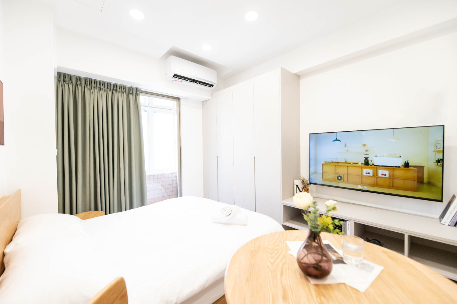 Cozy bedroom in Taipei Taiwan monthly apartment with premium bedding and quiet atmosphere with smart tv - Kolette Home