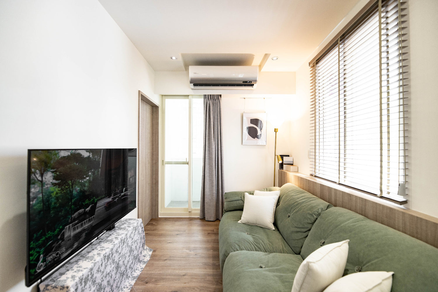 Modern living room in Taipei Taiwan short-term apartment with minimalist design - Kolette Home