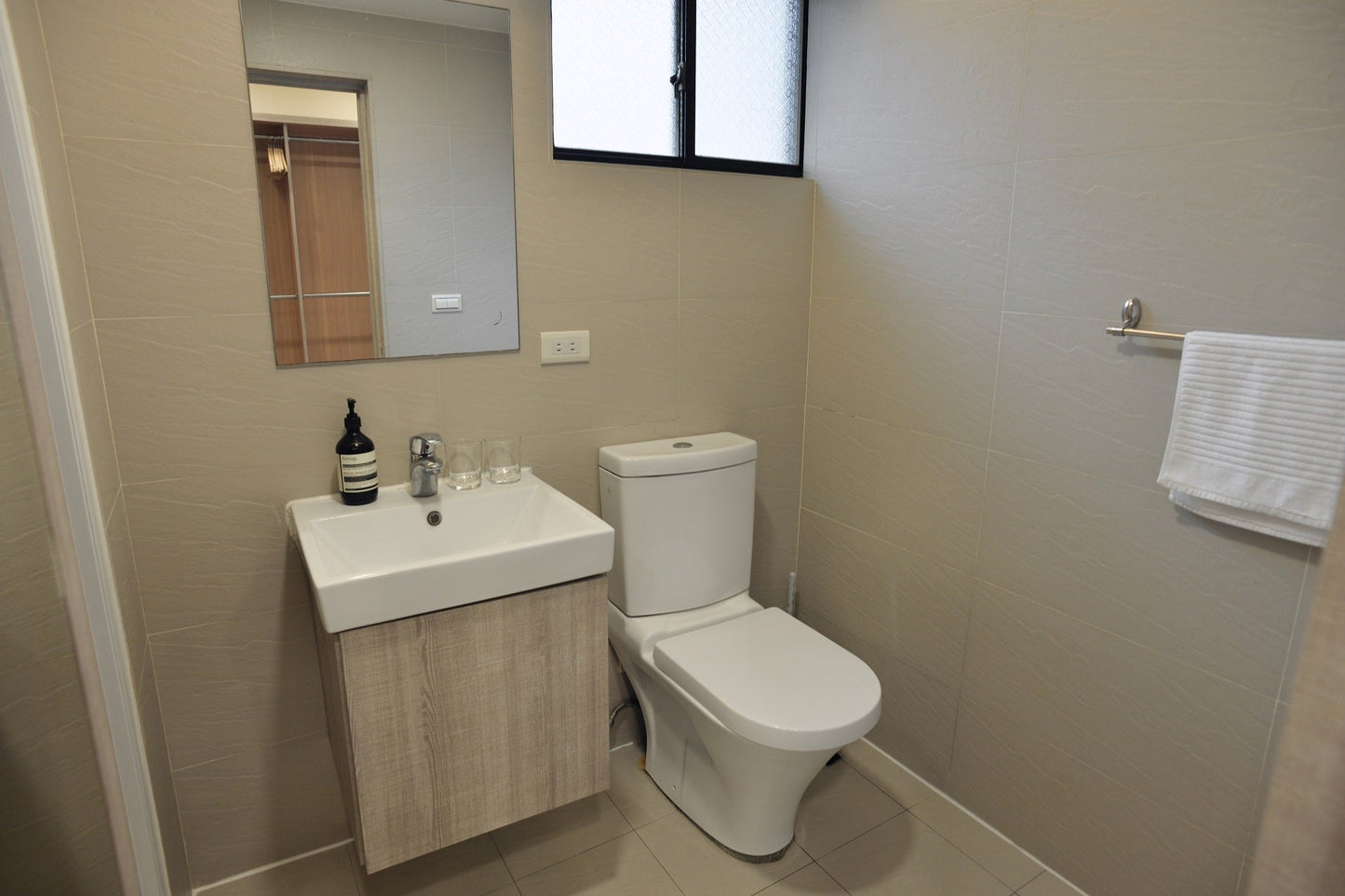 Clean hotel-grade bathroom in Taipei Taiwan short-term rental with shower - Kolette Home