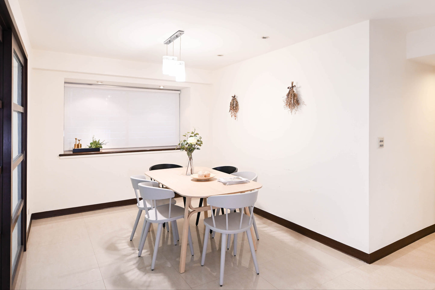 Modern Dining room in Taipei Taiwan short-term apartment with minimalist design - Kolette Home