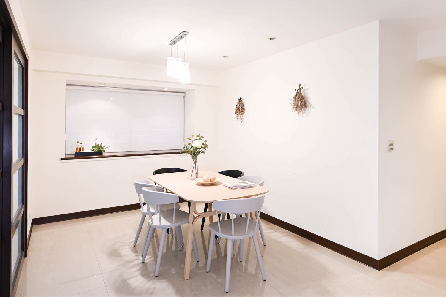 Modern Dining room in Taipei Taiwan short-term apartment with minimalist design - Kolette Home